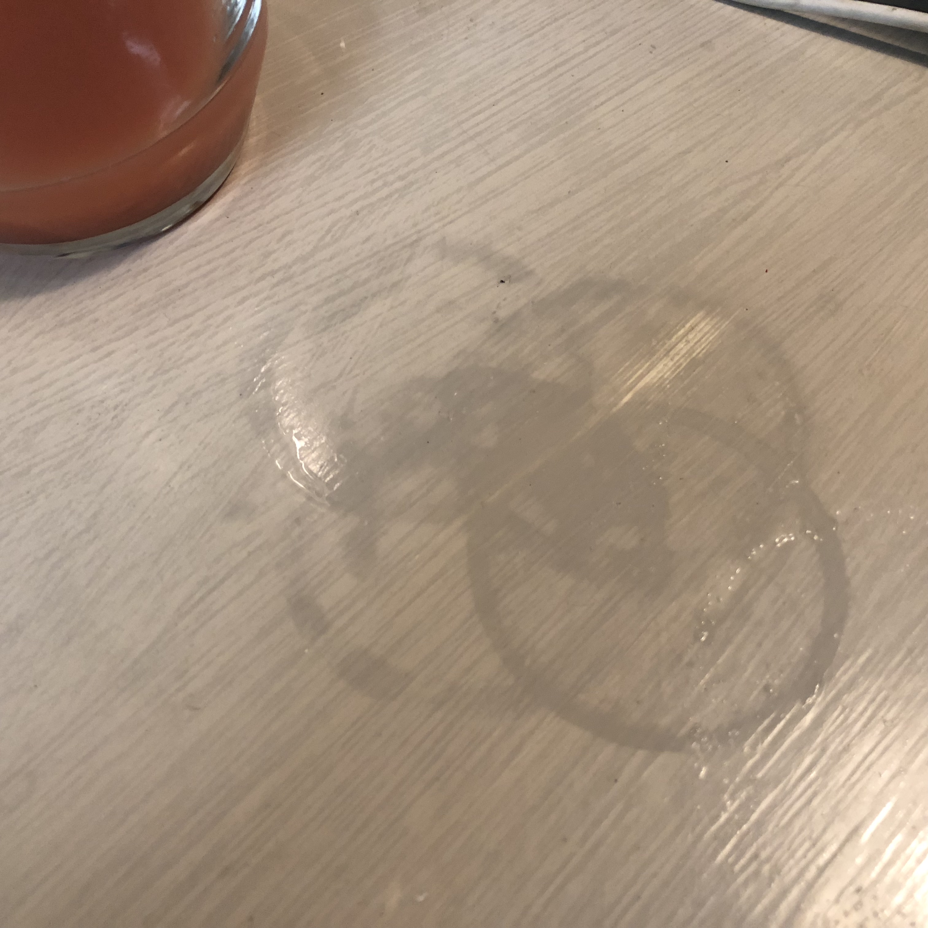 Overlapping water-ring stains on a tabletop were the impetus for the ETI