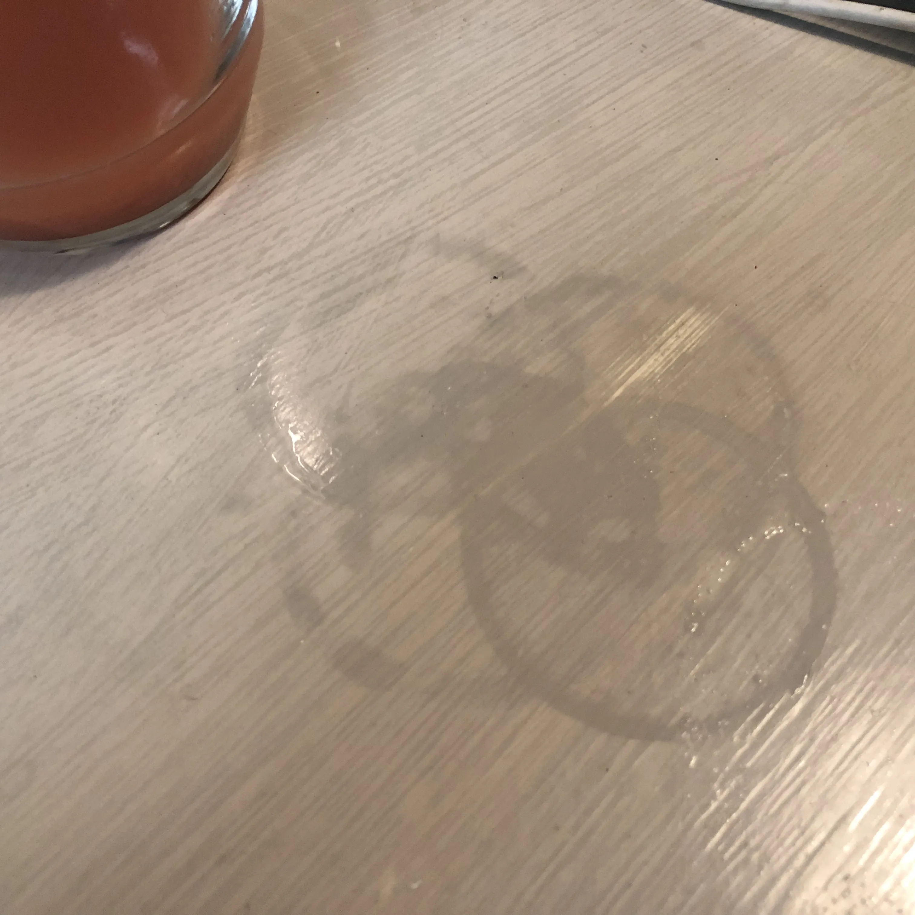 Overlapping water-ring stains on a tabletop were the impetus for the ETI